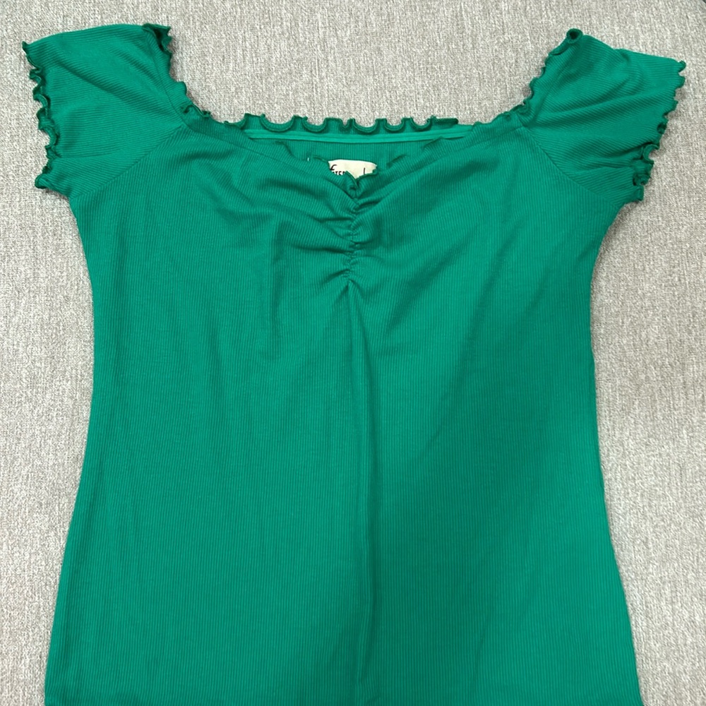 Green, ruffle sleeve shirt